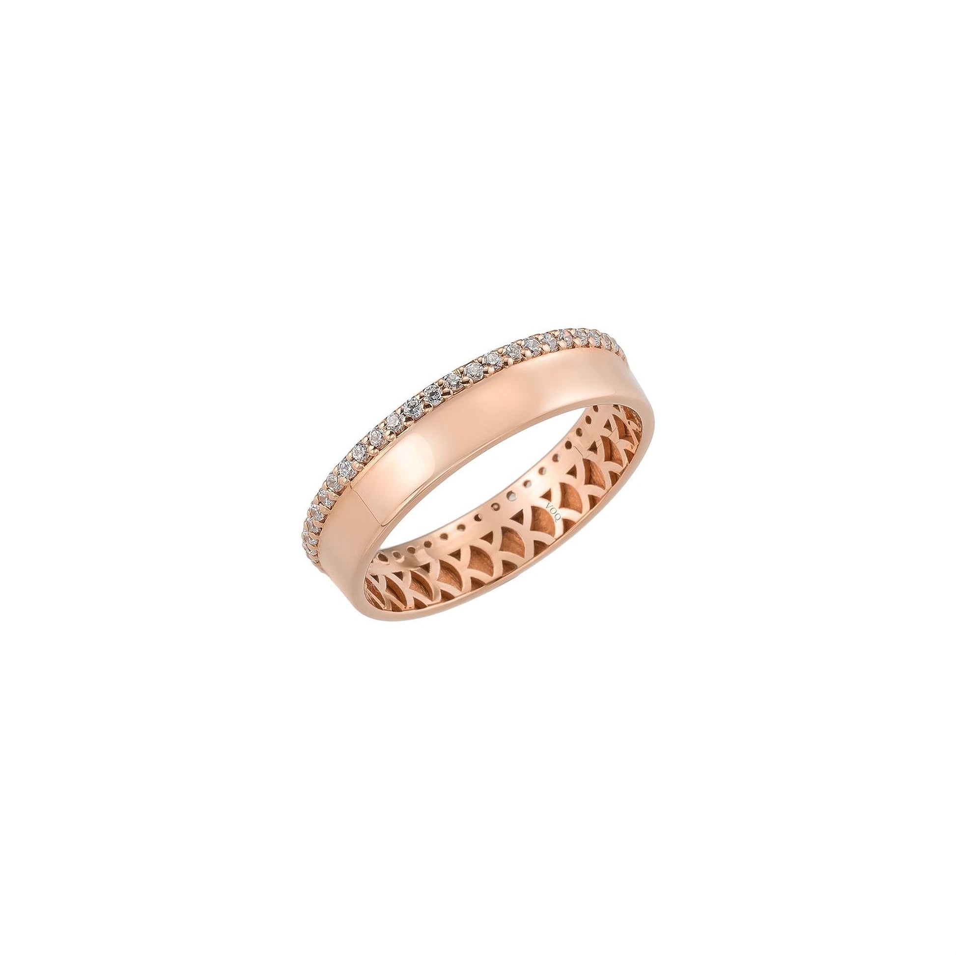 A rose gold ring with a diamond accent, showcasing a simple yet elegant design.