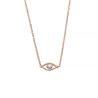 A delicate gold necklace with a pendant featuring a single diamond.