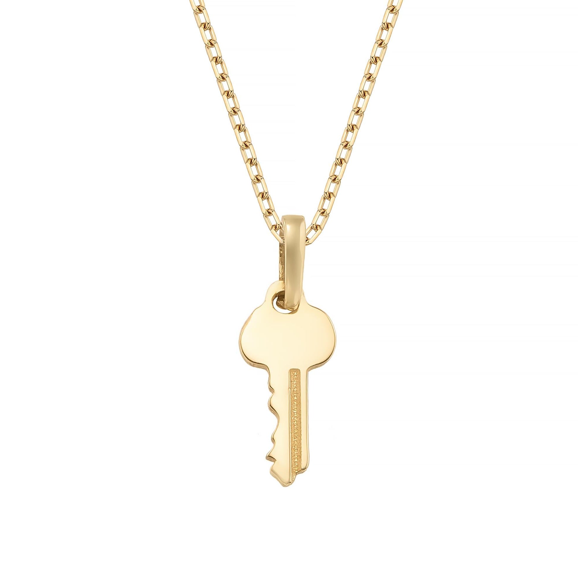A gold-colored necklace with a single key-shaped pendant.