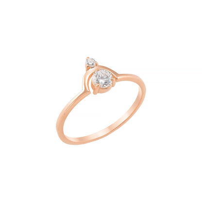 A rose gold ring with a large central diamond and two smaller diamonds on either side.