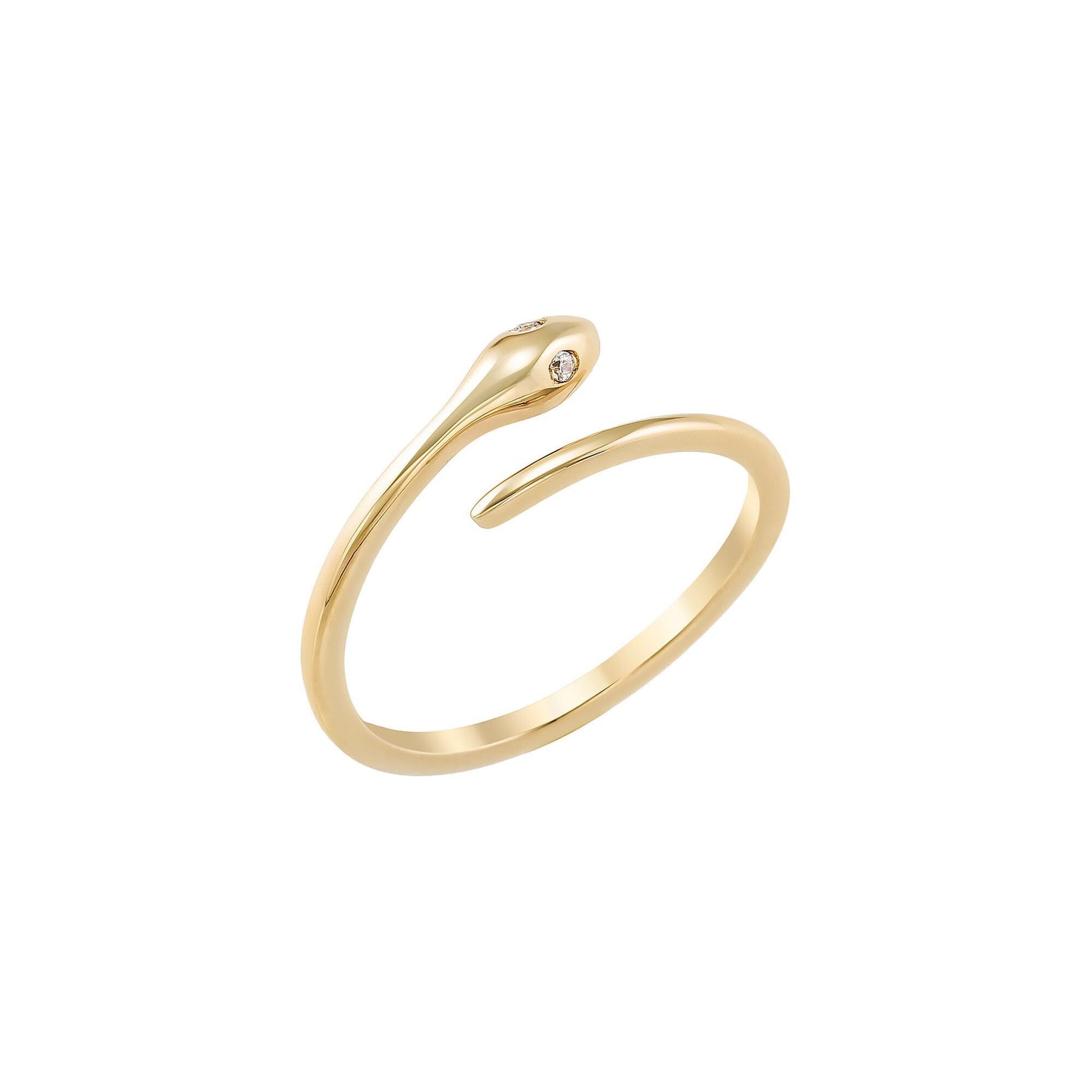 A gold ring with a snake-shaped design and a small gemstone.