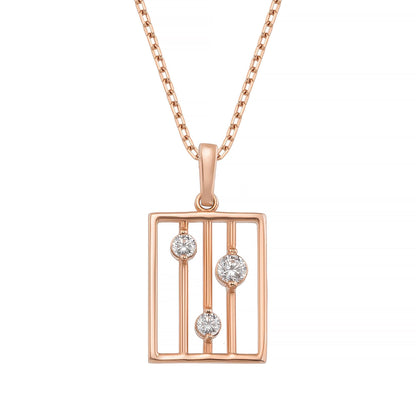 A rose gold necklace with a rectangular pendant featuring three diamonds set within a cage-like design.