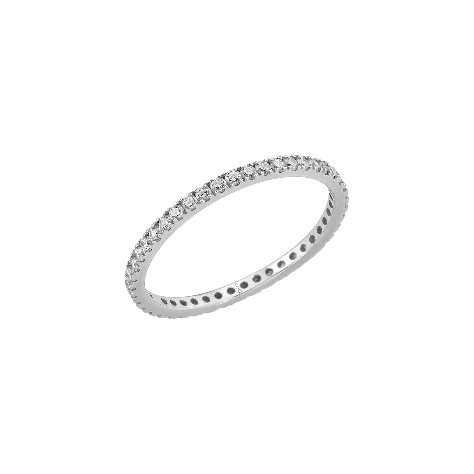 A silver-colored ring with a row of small diamonds along the band.