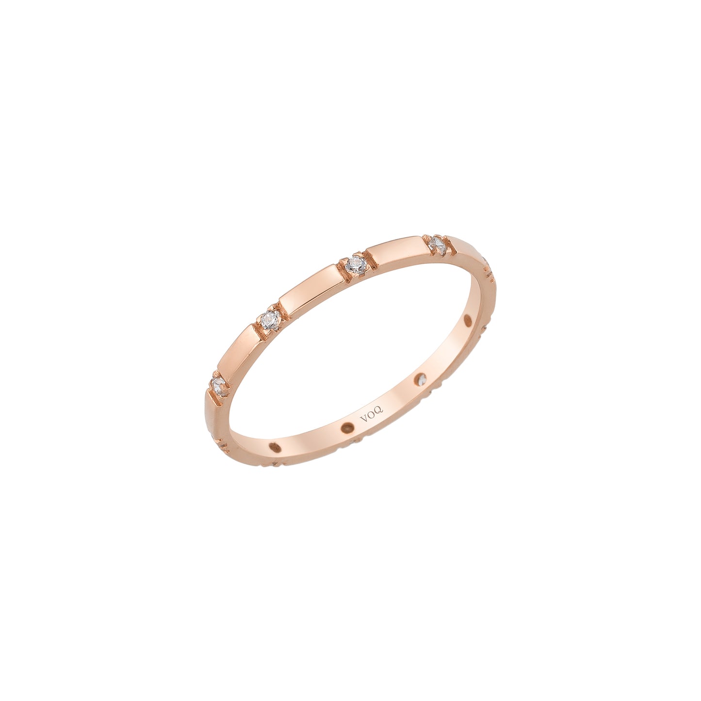A rose gold ring with small diamonds set in it.