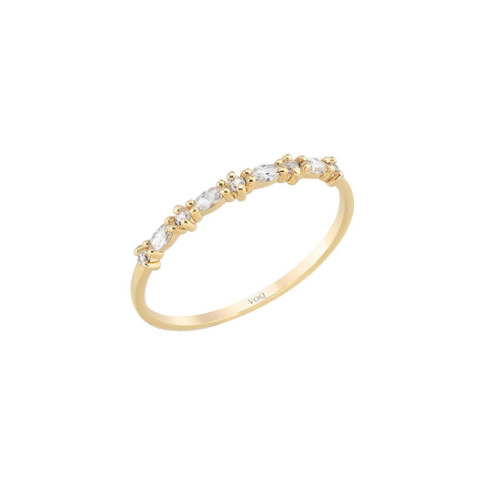 A gold ring with a row of small diamonds or gemstones set in the band.