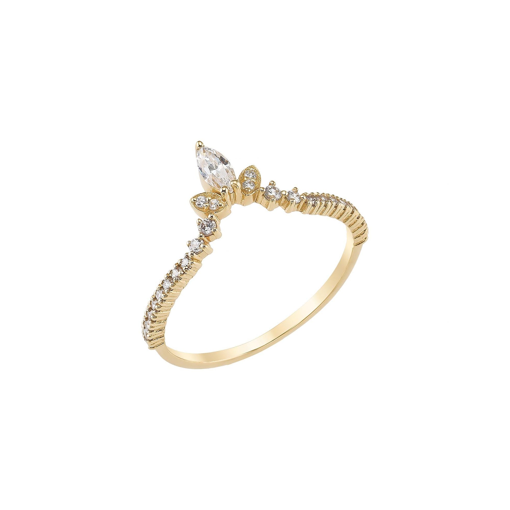 A gold ring with a large diamond in the center, surrounded by smaller diamonds and a floral design.