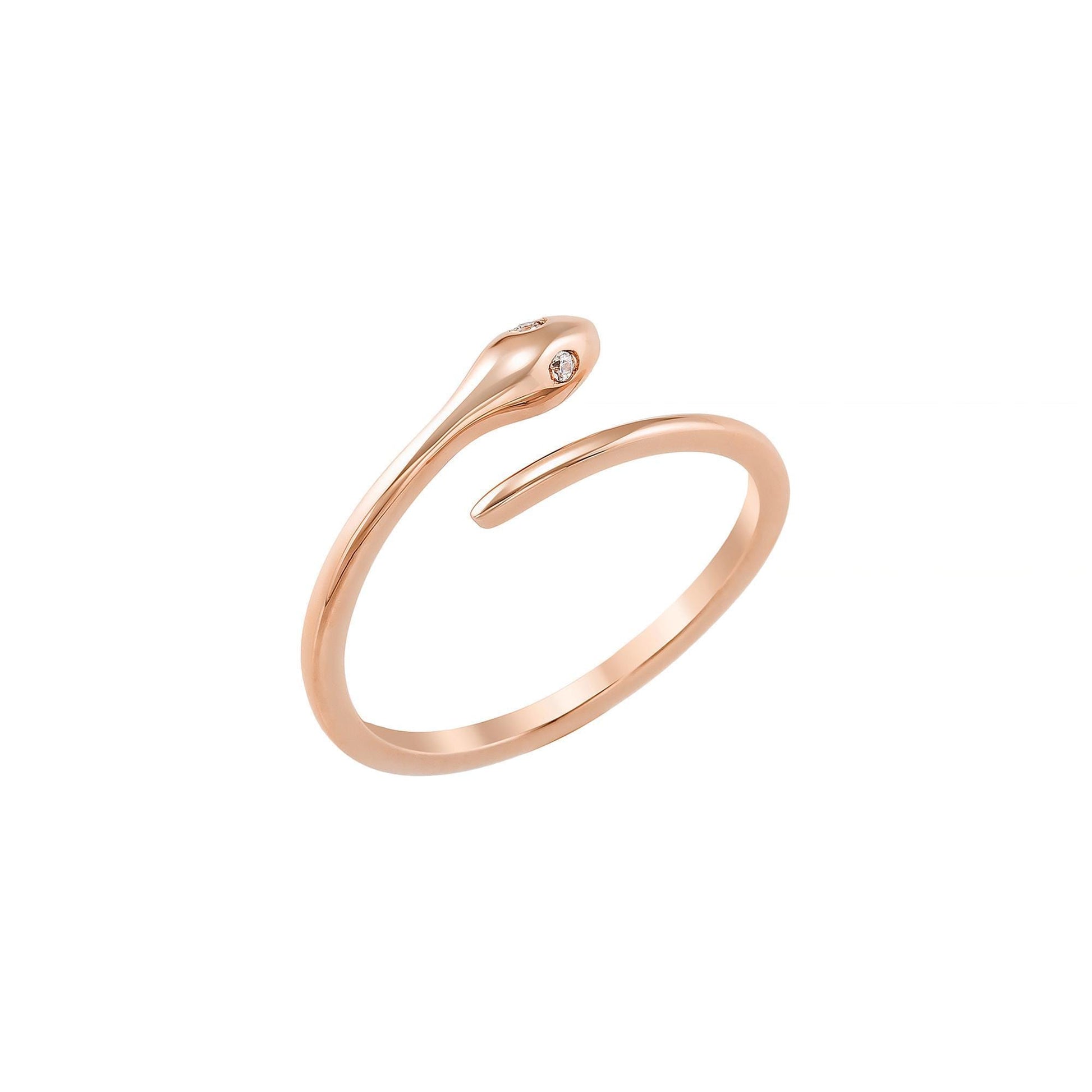 A gold-colored ring with a snake-like design and a small gemstone.